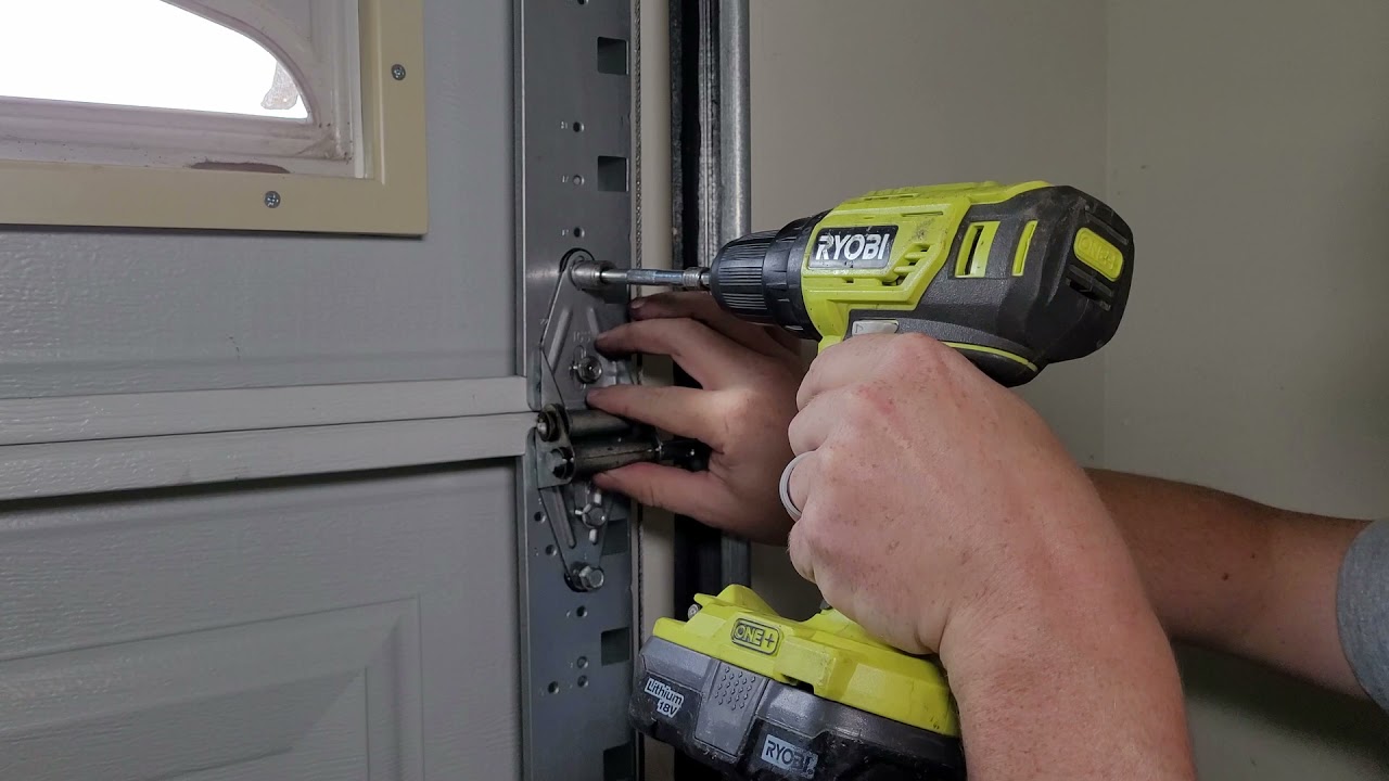 Certified technician performing a garage door repair