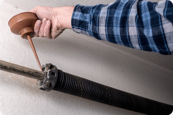 Replacing damaged mechanical components and springs on steel door setups