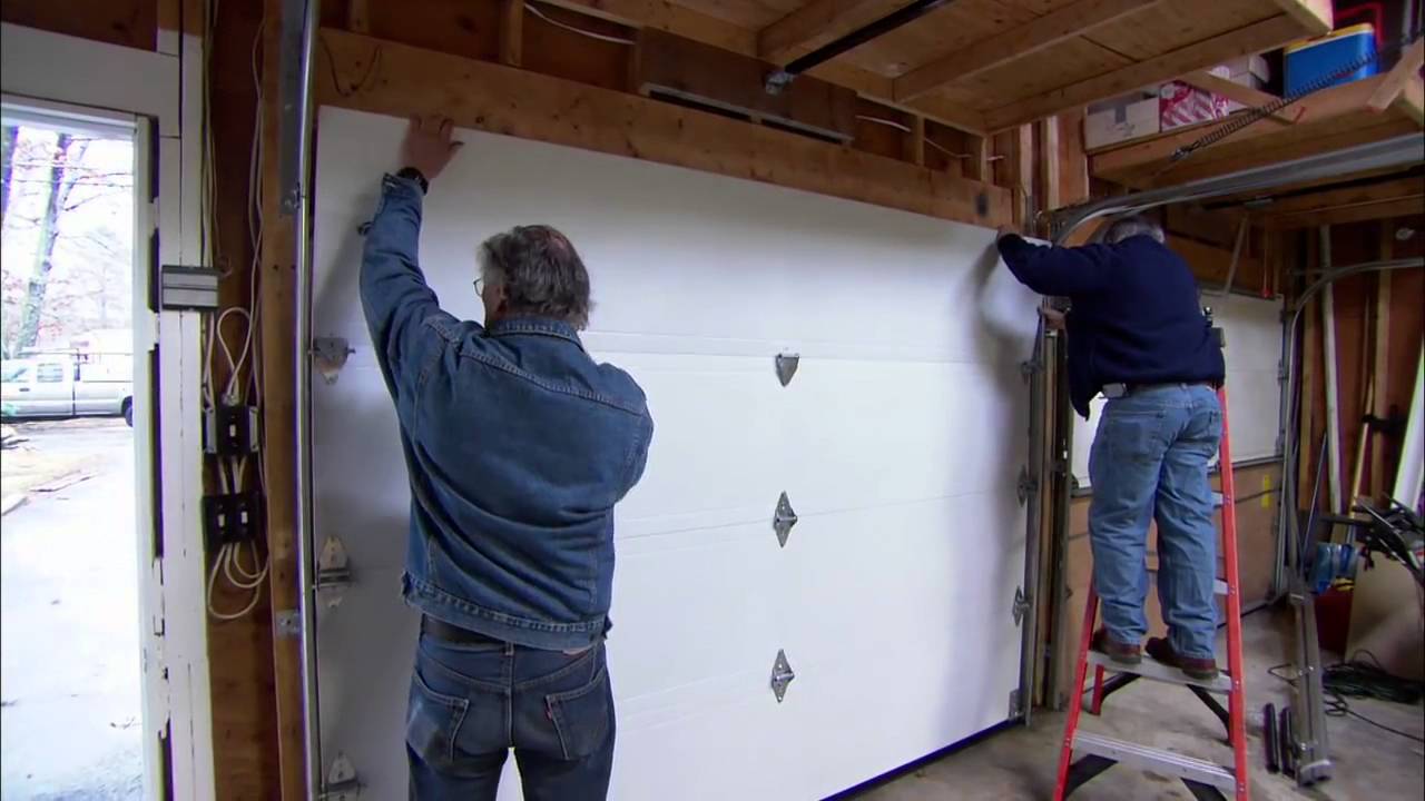 New garage door being installed on a San Antonio home