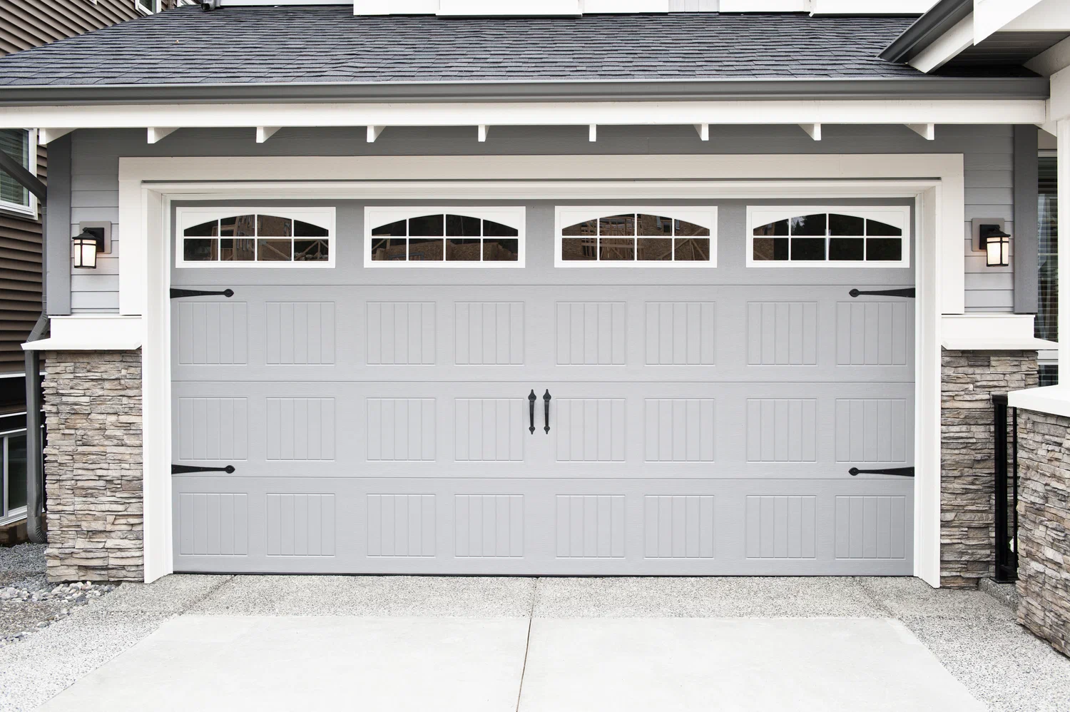 Completed garage door installation on a residential property