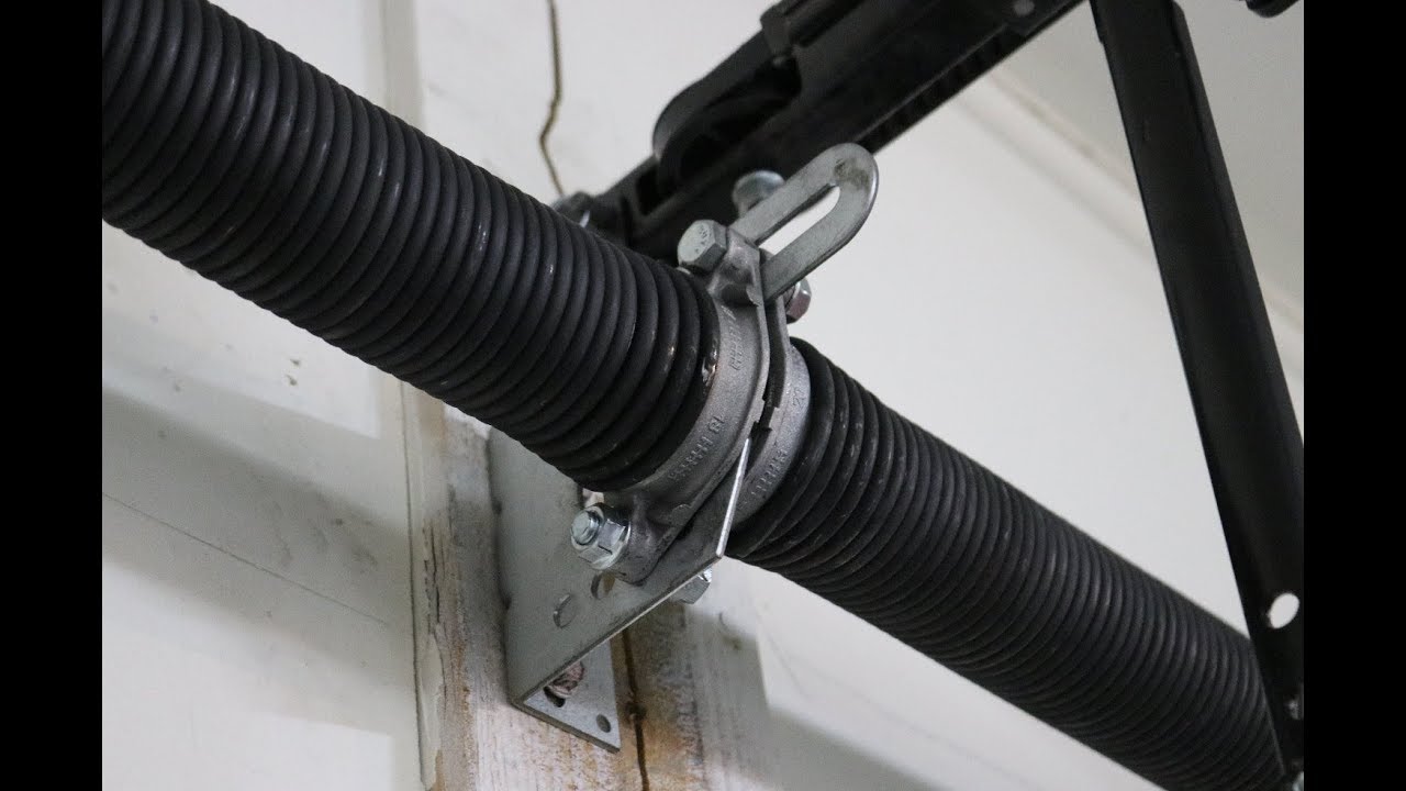 New garage door spring installed during a replacement job in San Antonio, TX