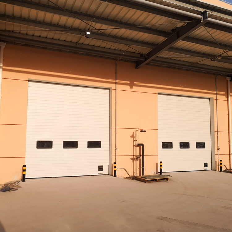 Sectional overhead door installed in a residential driveway